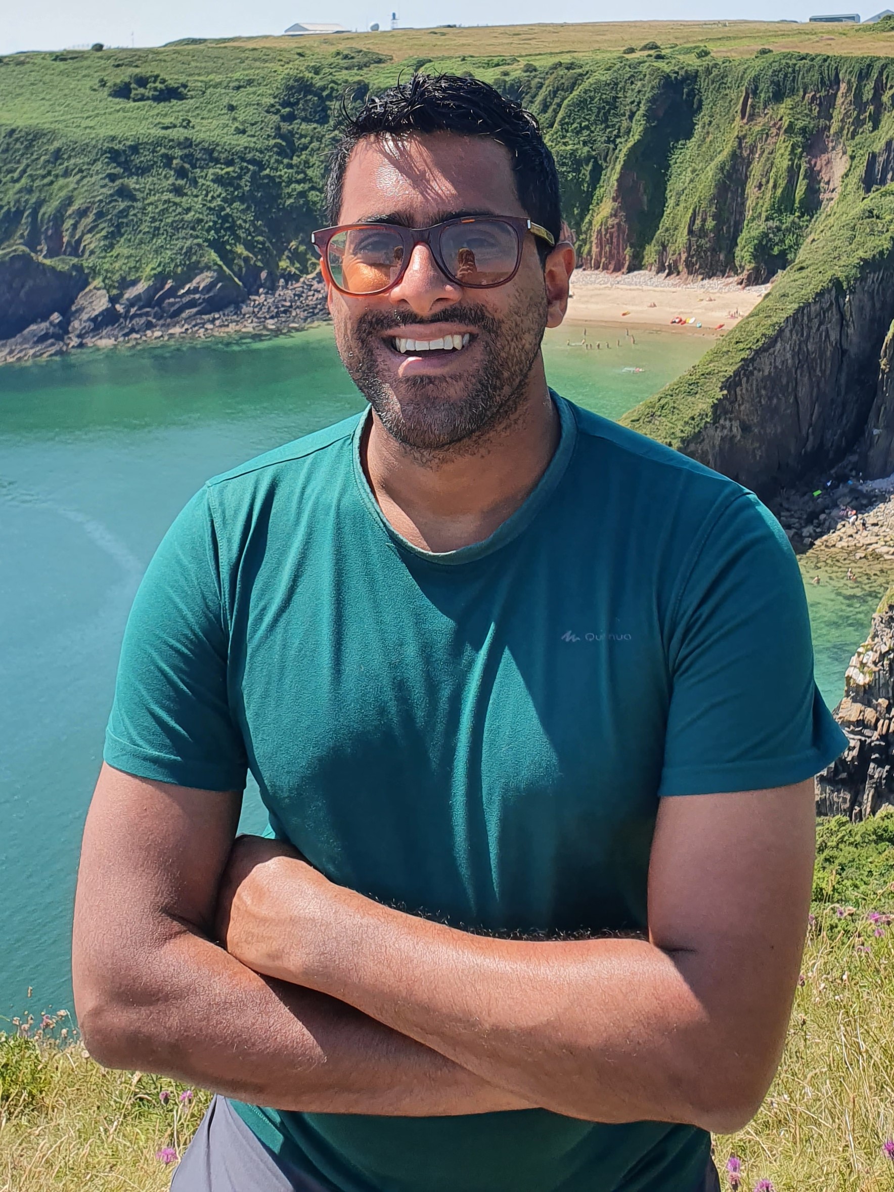 Chirag posing in front of mountains